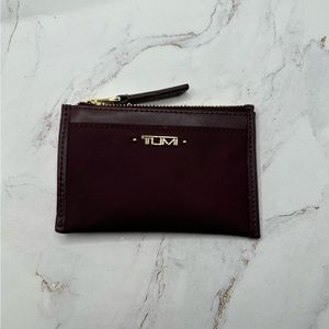 Purple Tumi Wallet